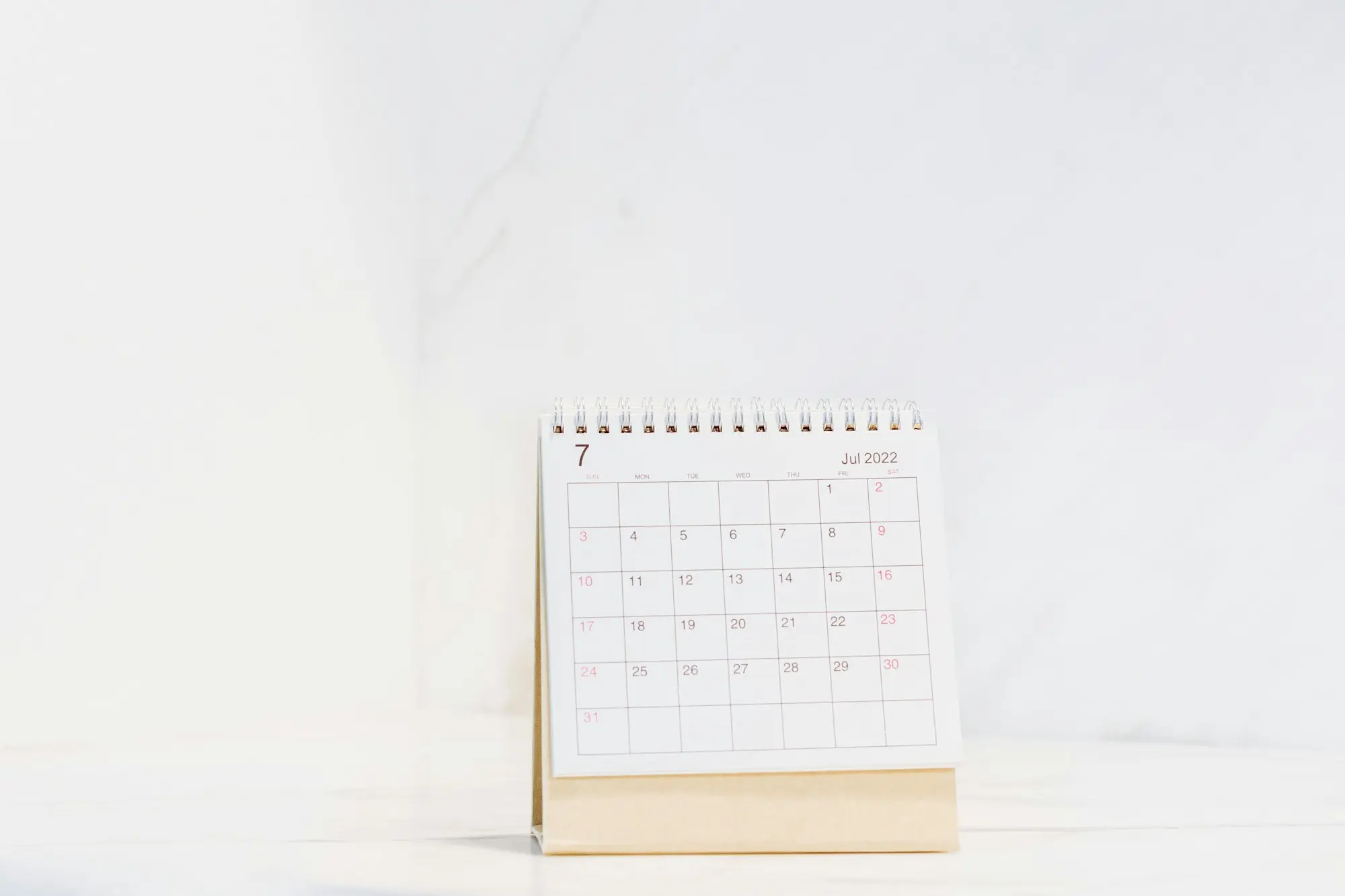 Desk calendar on a clean white table